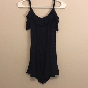 Navy blue romper with a ruffle neck!
